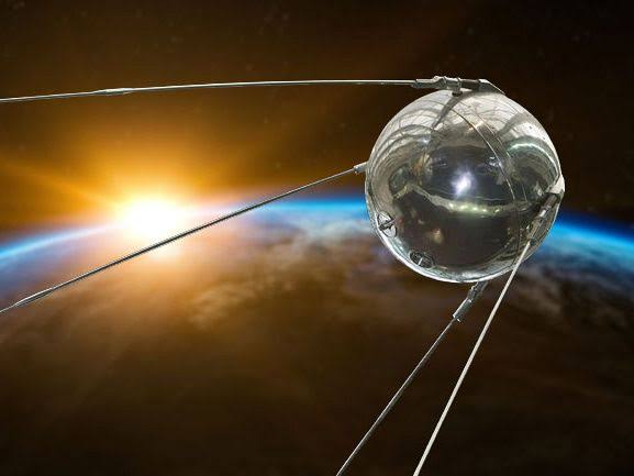 Who invented the first satellite and what was its function?